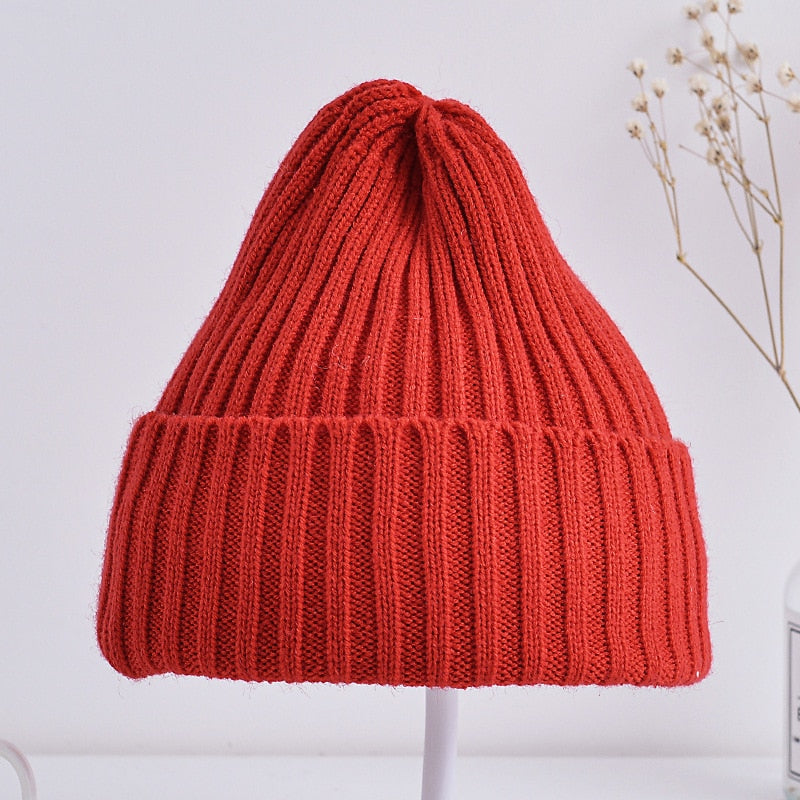 Cute and comfortable baby hat in soft cotton for winter warmth and style.