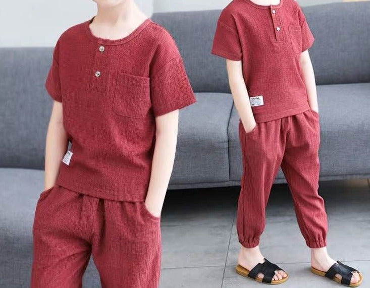 Pure Cotton Boy's Shirt and Shorts set in various colors and sizes, made from breathable cotton material. Ideal for active boys who sweat easily. Features v-neck design and comfortable fit. Please check sizing charts before ordering.