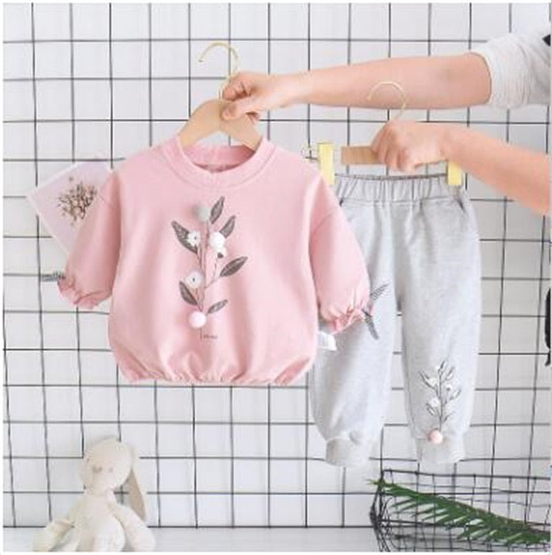 Image of Toddler Tracksuit - Made of comfortable and durable cotton and polyester. Vibrant prints and designs for unrestricted movement. Ideal for spring and summer activities.