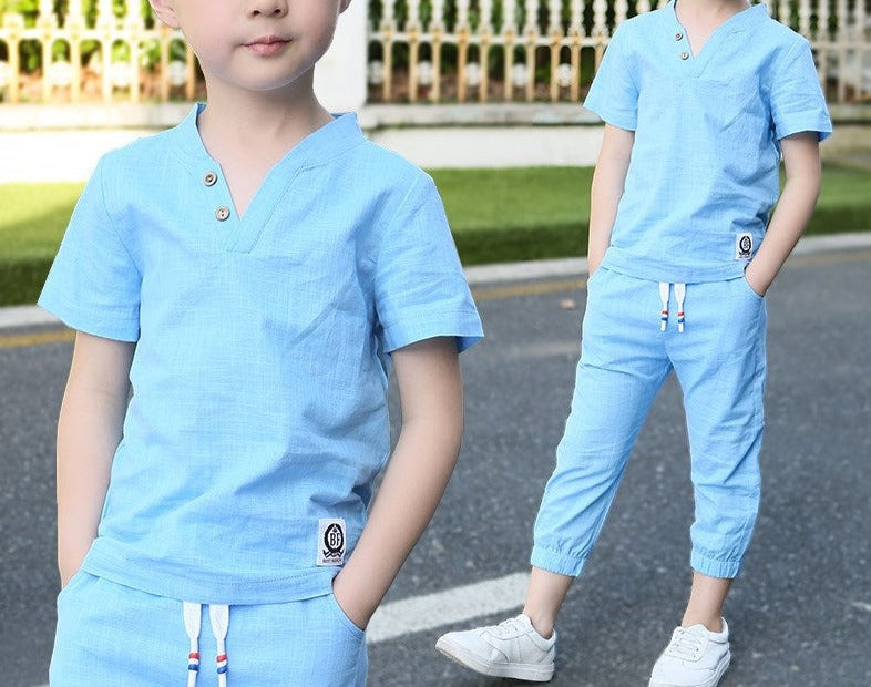 Pure Cotton Boy's Shirt and Shorts set in various colors and sizes, made from breathable cotton material. Ideal for active boys who sweat easily. Features v-neck design and comfortable fit. Please check sizing charts before ordering.