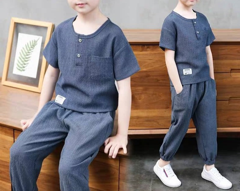 Pure Cotton Boy's Shirt and Shorts set in various colors and sizes, made from breathable cotton material. Ideal for active boys who sweat easily. Features v-neck design and comfortable fit. Please check sizing charts before ordering.