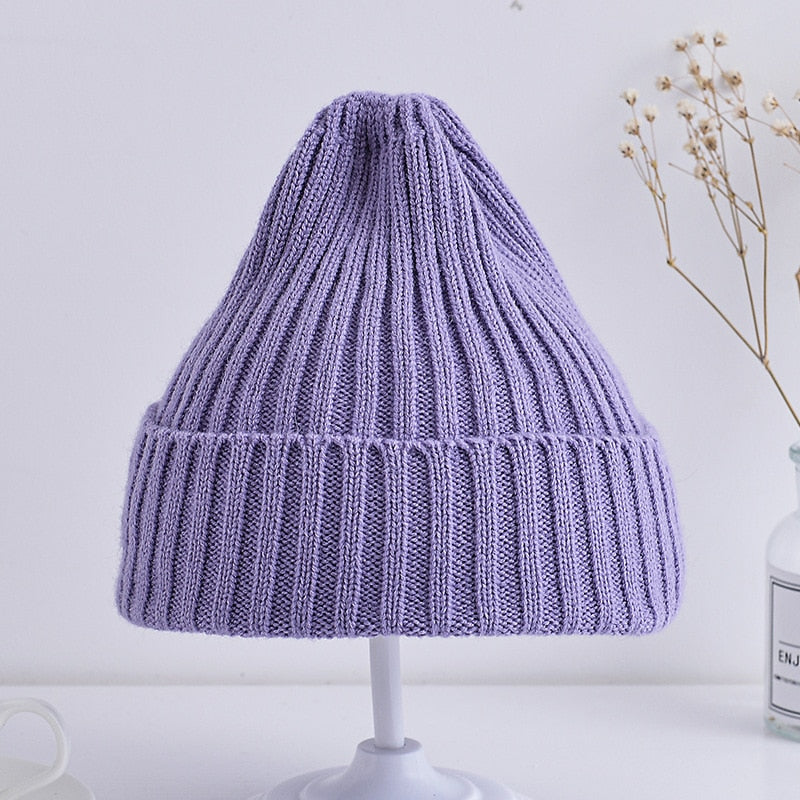 Cute and comfortable baby hat in soft cotton for winter warmth and style.