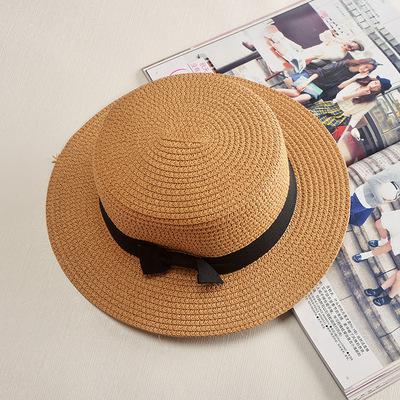 Stylish and durable summer beach hat made of straw and paper. Perfect for protecting you from the sun's heat while looking fashionable.