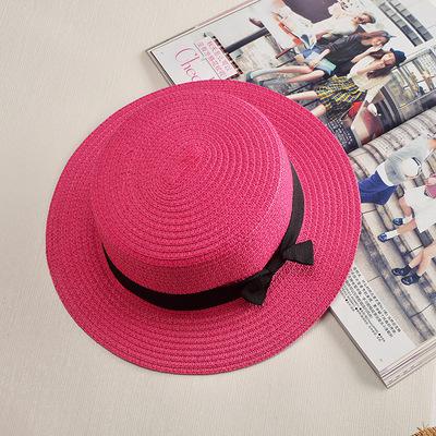 Stylish and durable summer beach hat made of straw and paper. Perfect for protecting you from the sun's heat while looking fashionable.