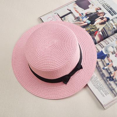 Stylish and durable summer beach hat made of straw and paper. Perfect for protecting you from the sun's heat while looking fashionable.