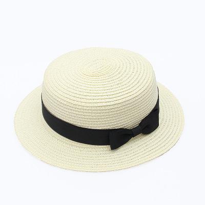 Stylish and durable summer beach hat made of straw and paper. Perfect for protecting you from the sun's heat while looking fashionable.