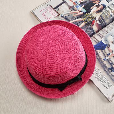 Stylish and durable summer beach hat made of straw and paper. Perfect for protecting you from the sun's heat while looking fashionable.