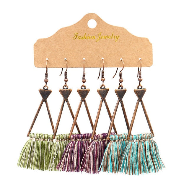 Boho Ethnic Tassel Drop Earrings - the perfect accessory for your beach attire. Stay fashionable and trendy with these stylish earrings. Available in different colors and styles to suit your preference.