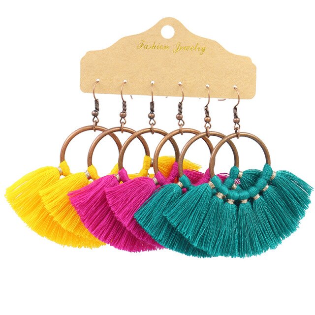 Boho Ethnic Tassel Drop Earrings - the perfect accessory for your beach attire. Stay fashionable and trendy with these stylish earrings. Available in different colors and styles to suit your preference.