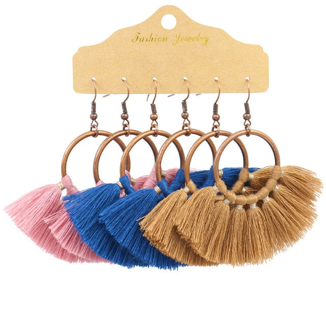 Boho Ethnic Tassel Drop Earrings - the perfect accessory for your beach attire. Stay fashionable and trendy with these stylish earrings. Available in different colors and styles to suit your preference.