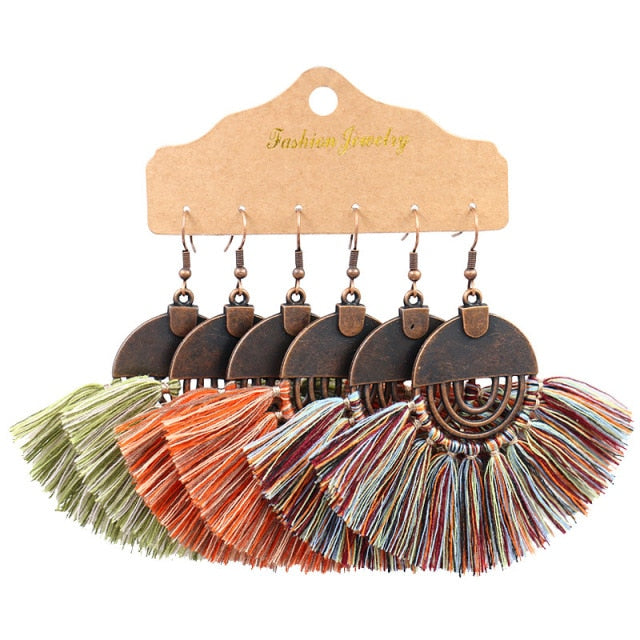 Boho Ethnic Tassel Drop Earrings - the perfect accessory for your beach attire. Stay fashionable and trendy with these stylish earrings. Available in different colors and styles to suit your preference.