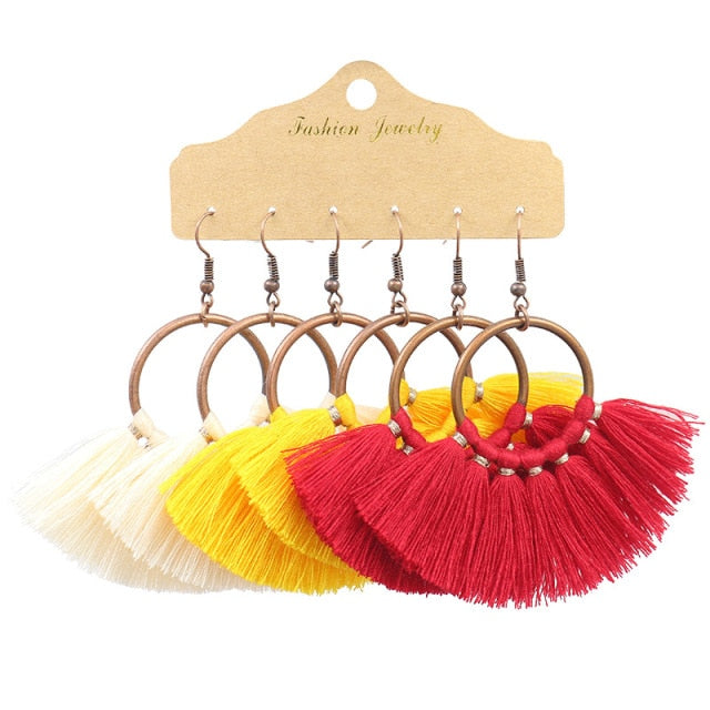 Boho Ethnic Tassel Drop Earrings - the perfect accessory for your beach attire. Stay fashionable and trendy with these stylish earrings. Available in different colors and styles to suit your preference.