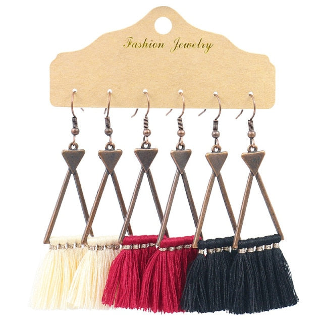 Boho Ethnic Tassel Drop Earrings - the perfect accessory for your beach attire. Stay fashionable and trendy with these stylish earrings. Available in different colors and styles to suit your preference.