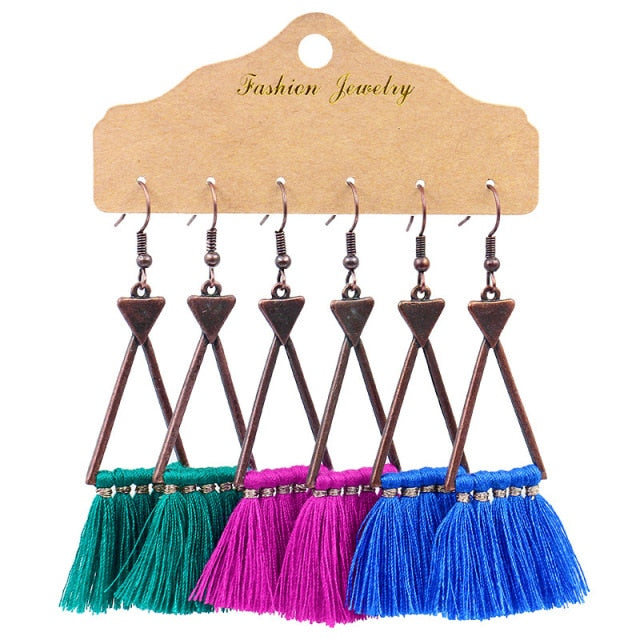 Boho Ethnic Tassel Drop Earrings - the perfect accessory for your beach attire. Stay fashionable and trendy with these stylish earrings. Available in different colors and styles to suit your preference.