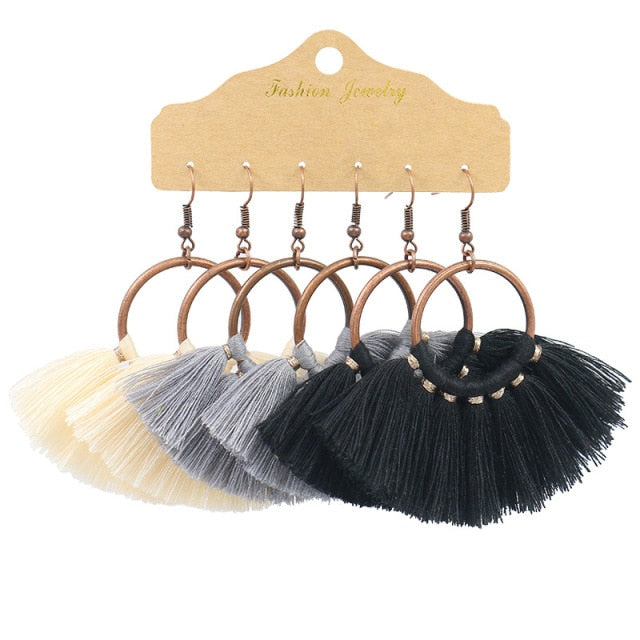 Boho Ethnic Tassel Drop Earrings - the perfect accessory for your beach attire. Stay fashionable and trendy with these stylish earrings. Available in different colors and styles to suit your preference.