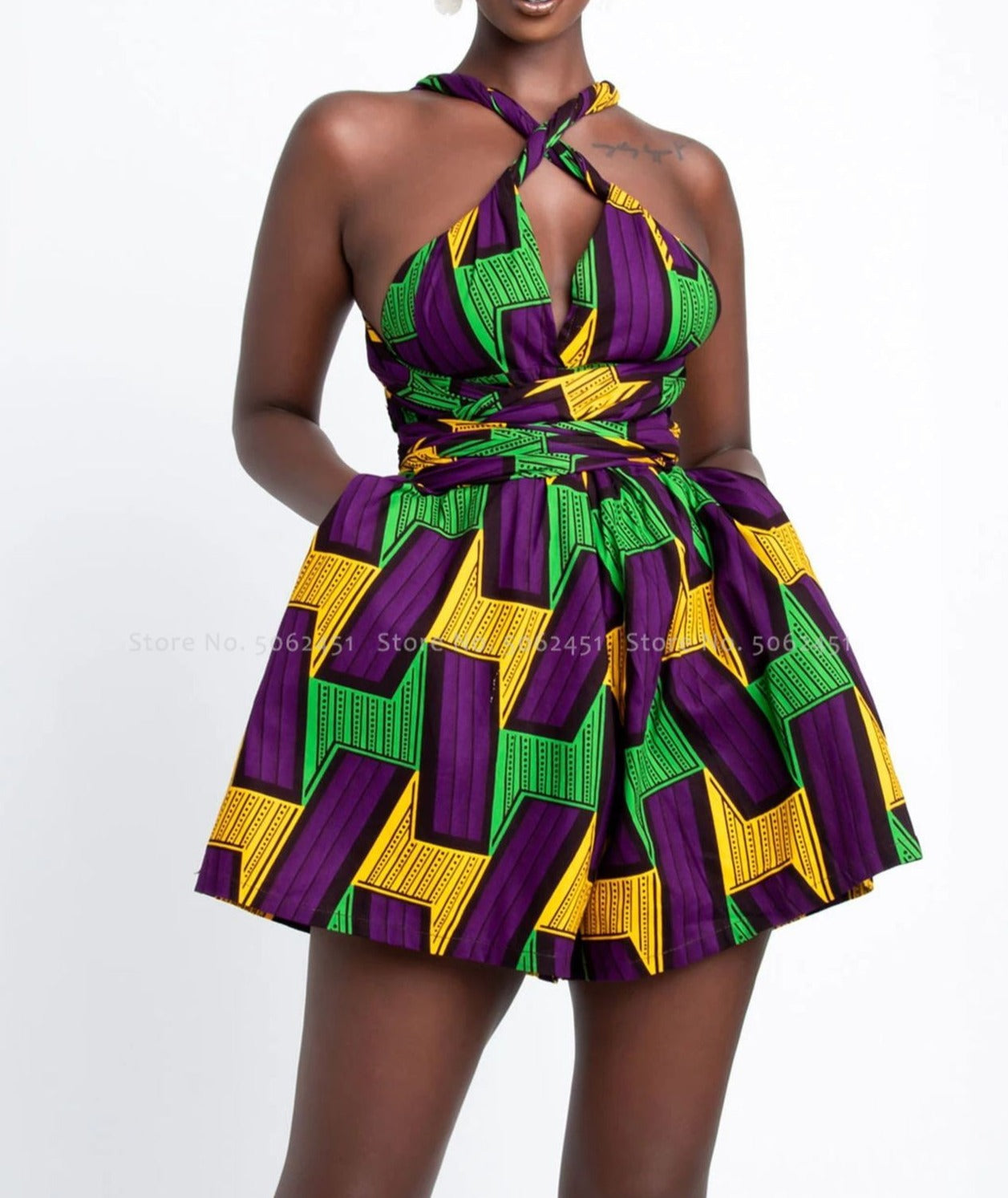 Sexy and stylish summer dress made of comfortable polyester fabric. Versatile design can be styled and worn to your liking. Combination of green, purple and yellow and available in various sizes. Order now while supplies last!