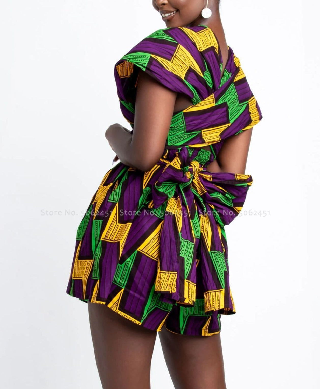 Sexy and stylish summer dress made of comfortable polyester fabric. Versatile design can be styled and worn to your liking. Combination of purple, green and yellow and available in various sizes. Order now while supplies last!