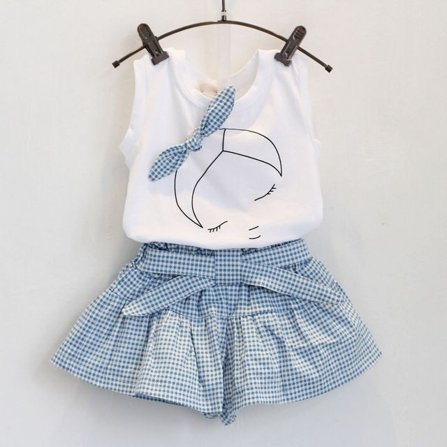 Image of Cute 2-Piece Summer Outfit - Stylish and comfortable summer outfit for girls. Includes a colorful tank top with short sleeves and elastic waistband shorts. Perfect for everyday summer wear. Pair with sandals or flip flops for an adorable look!