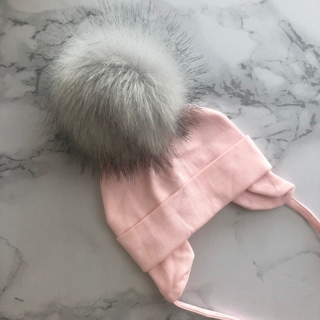 Organic & Hypoallergenic Baby Beanies | Super-Soft & Gentle on Newborn Skin | Variety of Colors & Patterns | Pom-Topped Cable-Knit Design | Shop Now!