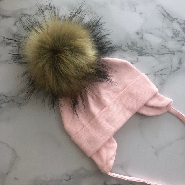 Organic & Hypoallergenic Baby Beanies | Super-Soft & Gentle on Newborn Skin | Variety of Colors & Patterns | Pom-Topped Cable-Knit Design | Shop Now!