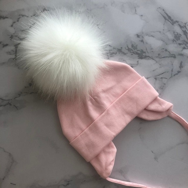 Organic & Hypoallergenic Baby Beanies | Super-Soft & Gentle on Newborn Skin | Variety of Colors & Patterns | Pom-Topped Cable-Knit Design | Shop Now!