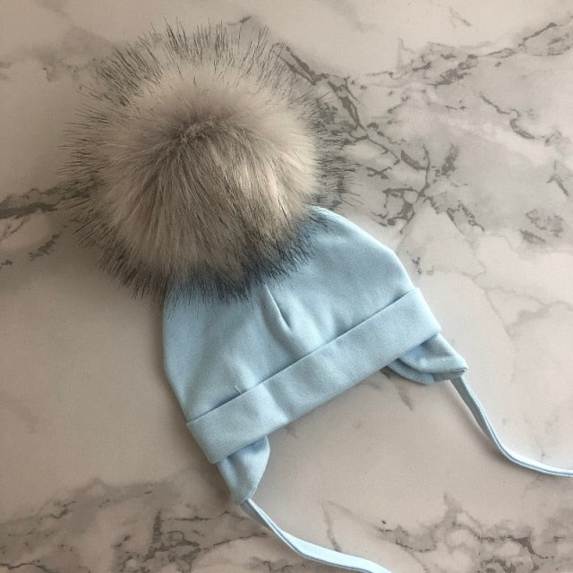 Organic & Hypoallergenic Baby Beanies | Super-Soft & Gentle on Newborn Skin | Variety of Colors & Patterns | Pom-Topped Cable-Knit Design | Shop Now!