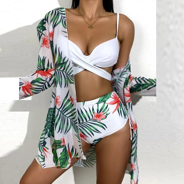 A woman wearing a Summer Sexy Floral Print Swimsuit, with a beautiful floral print design and made of comfortable cotton and polyester fabric.