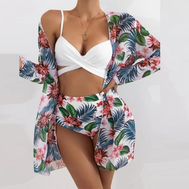 A woman wearing a Summer Sexy Floral Print Swimsuit, with a beautiful floral print design and made of comfortable cotton and polyester fabric.