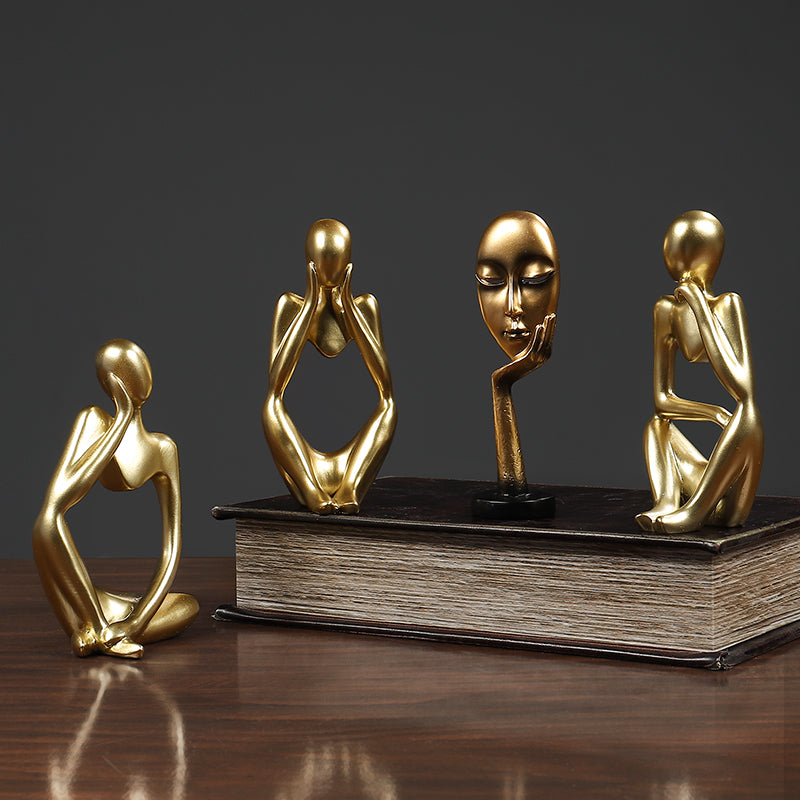 Thinker Abstract Statue in gold, showcasing artistic beauty, perfect for home decor or gifting.