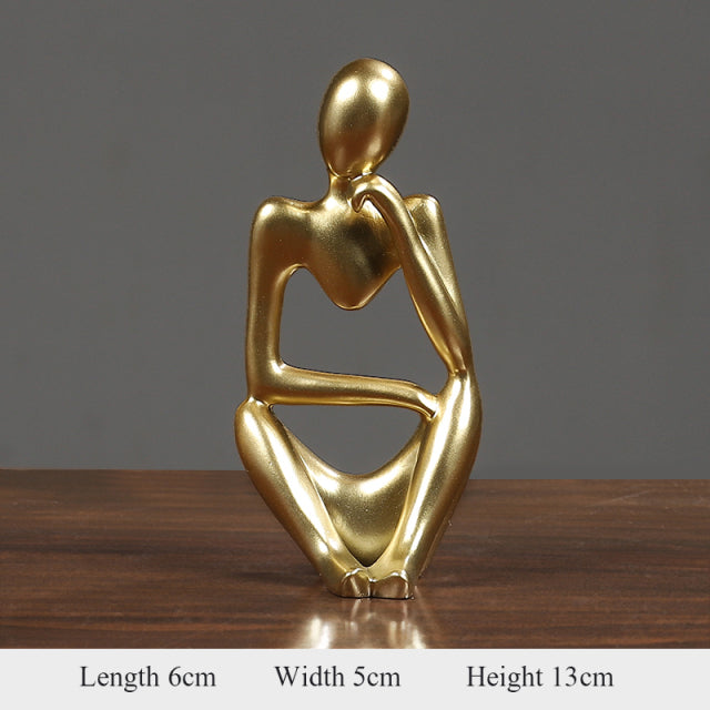 Thinker Abstract Statue in gold, showcasing artistic beauty, perfect for home decor or gifting.