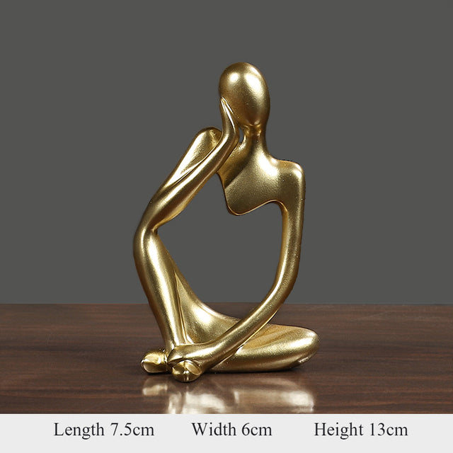 Thinker Abstract Statue in gold, showcasing artistic beauty, perfect for home decor or gifting.