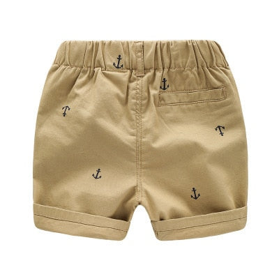 Comfortable Summer Boys Beach Shorts, cotton fabric, elastic waistband, sizes 4-9 years old, Khaki, Light Blue, and Navy Blue colors.