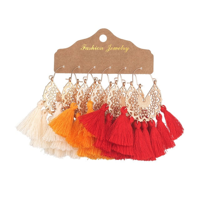 Boho Ethnic Tassel Drop Earrings - the perfect accessory for your beach attire. Stay fashionable and trendy with these stylish earrings. Available in different colors and styles to suit your preference.