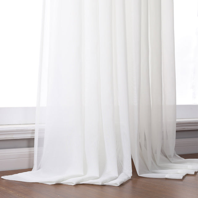 Enhance the look of your living space with these beautiful and versatile curtains. Perfect for use as a window treatment, room divider, or closet door, these curtains are designed to add a touch of elegance to any room in your home. Available in different sizes to fit your windows, they're made of light fabric that's ideal for warm weather when you want to let in fresh air and keep your curtains open all day long. Shop now and transform your home décor!