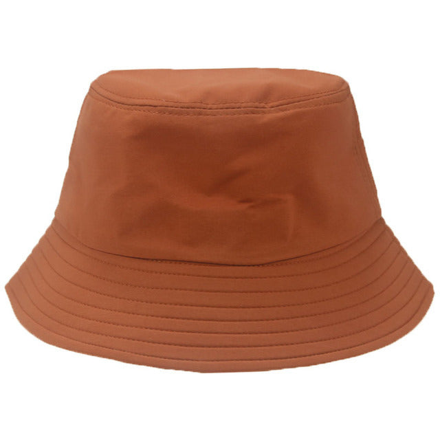 100% cotton bucket hat, sun protection for any season, vibrant colors. Also doubles as a party hat. Timeless quality guaranteed.