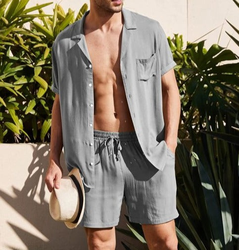 Image of a stylish and comfortable casual outfit for men, perfect for upgrading summer wardrobe. The outfit features a V-neck top and elastic waistband shorts designed for ultimate comfort and versatility. Available in various sizes and colors to fit different preferences. Shop now and elevate your man's summer style!