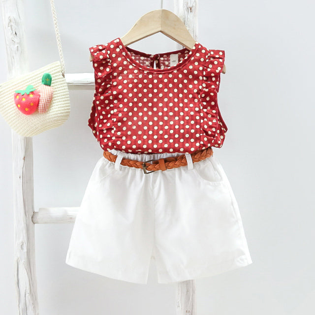 Image of Cute 2-Piece Summer Outfit - Stylish and comfortable summer outfit for girls. Includes a colorful tank top with short sleeves and elastic waistband shorts. Perfect for everyday summer wear. Pair with sandals or flip flops for an adorable look!