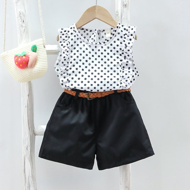 Image of Cute 2-Piece Summer Outfit - Stylish and comfortable summer outfit for girls. Includes a colorful tank top with short sleeves and elastic waistband shorts. Perfect for everyday summer wear. Pair with sandals or flip flops for an adorable look!