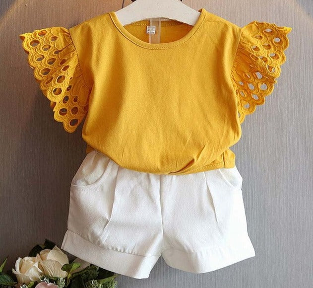 Image of Hollow Sleeve Tops and Shorts - Stylish and comfortable summer outfit for girls. Available in various colors and sizes. Made with cotton, stretch, and spandex for a perfect fit. Solid design adds a cute touch. Perfect for young fashionistas this summer!