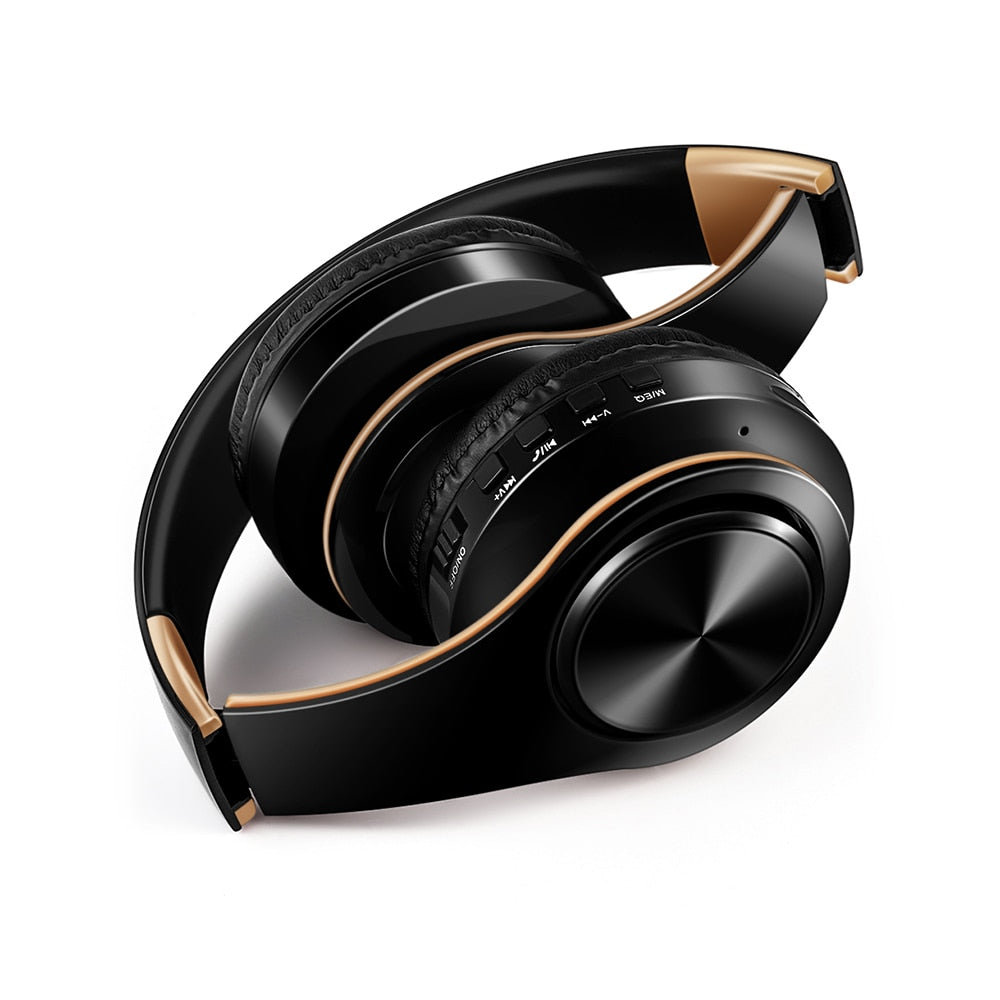 Wireless headphones with Bluetooth V5.0+EDR Technology. Includes FM radio and USB port. Hands-free communication with phone and PC/Macbook. Sleek design for comfort and style. Convenient play/pause, call answering, and volume control.